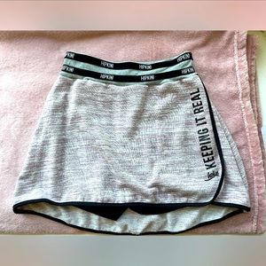 Hipkini swimming skirt. Pale pink and gray. Size M. NWT